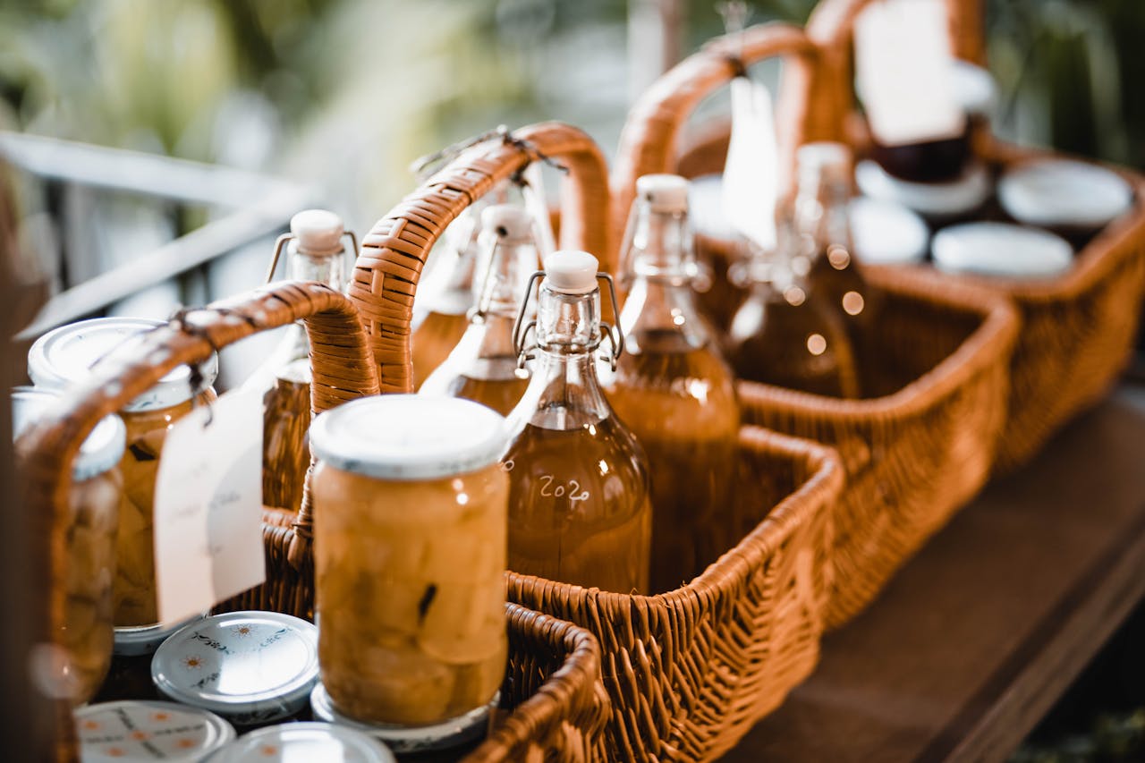 Mastering the First Impression: Your intriguing post title goes here An assortment of jars and bottles in wicker baskets captured outdoors with natural light.